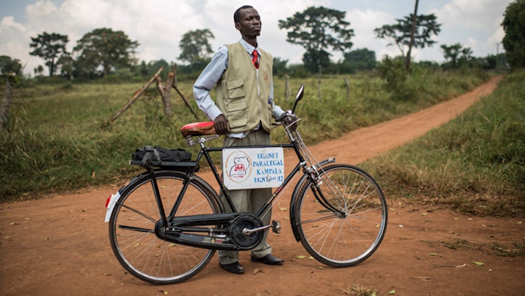 A paralegal with his bicycle