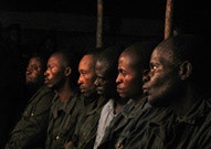 Rape suspects sitting in a row