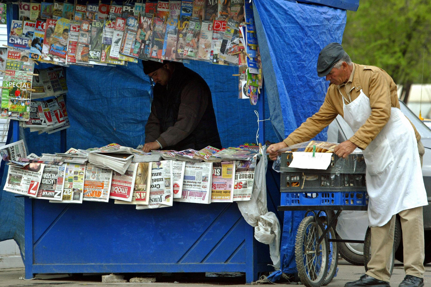 A man operating a pretzel stand