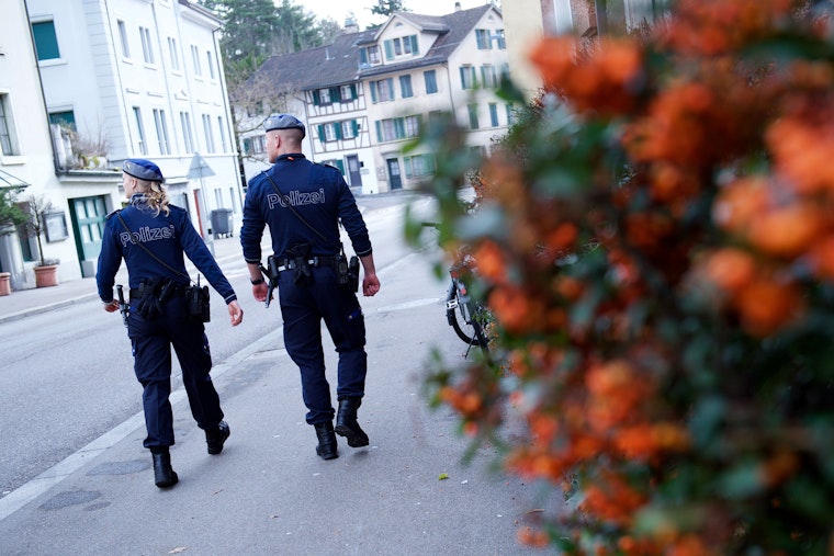 Police officers patrol in Zurich.